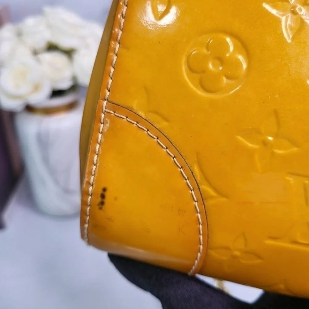 𝅺louis VUITTON VERNIS STA. MONICA CLUTCH
